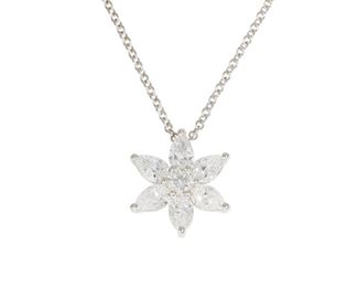 1112
A Diamond Flower Pendant Necklace
Platinum
Suspending a flower detachable flower pendant set with six pear and one round diamond, totaling 2.22cts and graded F-G color and VS clarity, with neck chain
16" L x .5" H
7.6 grams
2 pieces
Estimate: $4,000 - $6,000