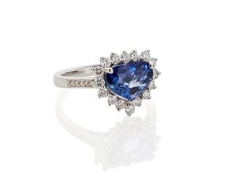 1118
A Sapphire And Diamond Heart Ring
Platinum
Centering a heart-shaped sapphire, gauged at approximately 2.5cts, and surrounded by seventeen full-cut round diamonds, totaling approximately .6ct and graded G-H color and SI clarity
Ring size: 7.5
5.85 grams
Estimate: $2,000 - $3,000