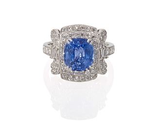 1123
A Sapphire And Diamond Ring
Platinum
Centering a cushion-cut sapphire, weighing 3.39cts with GIA certificate dated April 7, 2017 stating heat treatment, surrounded by sixty-eight full-cut round diamonds, totaling approximately .9ct and graded G-H color and SI clarity
Ring size: 7.75
9.95 grams
Estimate: $3,500 - $4,500