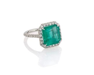1127
A Tiffany & Co. Emerald And Diamond Ring
Platinum, stamped: (c) / Tiffany & Co. / Pt 950
Centering a rectangular-cut emerald, measuring 11.82 mm x 1.44 mm x 7.52 mm and gauged at approximately 6.9cts with GIA certificate dated February 24, 2021 stating that there is clarity enhancement (F2), surrounded and flanked by forty full-cut diamonds, totaling approximately 1.2cts and graded F-G color and VS clarity, with signed blue suede box
Ring size: 7.5
8.7 grams
Estimate: $20,000 - $30,000