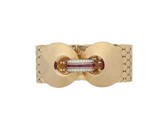 1136
A Retro Diamond And Simulated Ruby Bracelet
14k yellow gold
Centering a gold sculptural motif centering a band of twenty-two full-cut round diamonds centering a row of simulated rubies
6.75" L x 1" W
64 grams
Estimate: $2,500 - $3,500