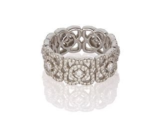 1142
A Debeers "Enchanted Lotus" Eternity Band
18k white gold, stamped: Debeers / 750 / A89819
Designed with three hundred-one pave-set with diamonds, totaling1.09cts and graded F-G color and VS clarity, with Debeers passport and signed wooden box
Ring size: 5.5
6 grams
Estimate: $1,000 - $1,500