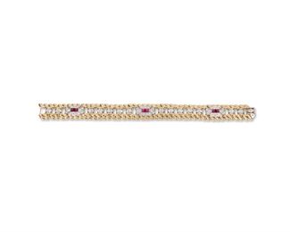 1144
A Diamond And Ruby Bracelet
Platinum and 14k yellow gold
Designed with three rectangular platinum terminals set with cabochon rubies, further set with sixty-six full-cut round diamonds, totaling approximately 2.65cts and graded G-H color and VS clarity, flanked by a rope work gold frame
7" L x .5" W
48.5 grams
Estimate: $2,000 - $3,000