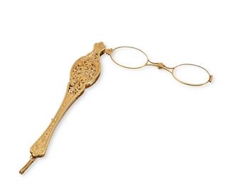 2002
A Victorian Gold Lorgnette
Circa 1885, test 18k yellow gold
Designed with an openwork foliate motif and organic engraving, opening to reveal eye glasses
6.75" L x 1.25"
44.5 grams
Estimate: $1,800 - $2,500