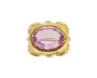 2003
A Pink Synthetic Spinel Brooch
14k yellow gold
Centering a large pink synthetic spinel within an engraved frame
1.5" L x 1.75" W
27.31 grams
Estimate: $200 - $300
