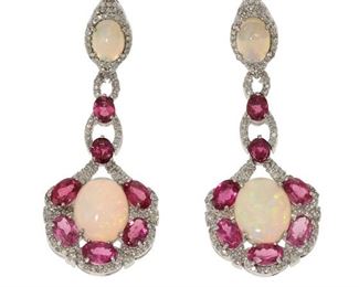 2016
A Pair Of Opal, Tourmaline, And Diamond Ear Pedants
Silver
Set with four cabochon opals surrounded by fourteen oval-cut pink tourmalines, further set with round diamonds, totaling approximately 1ct and graded G-H color and SI clarity.
2" L
12 grams
2 pieces
Estimate: $400 - $600