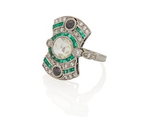 2017
A Diamond And Gem-Set Ring
Platinum
Centering a rose cut diamond, measuring 7 mm x 8 mm x 1 mm, surrounded by two round black diamonds, baguette-cut emeralds and small round diamonds
Ring size: 6.5
5.7 grams
Estimate: $1,800 - $2,500