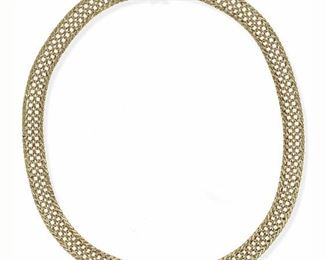 2039
A Gold Necklace
14k yellow gold
With slightly graduated woven links
17.5" L x .5" W
45.6 grams
Estimate: $1,500 - $2,000