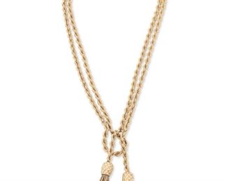 2041
A Gold Tassel Necklace
Circa 1950, 14k yellow gold
Designed as a double strand rope chain suspending two tassels
15" L x 3" H
77 grams
Estimate: $2,500 - $3,500