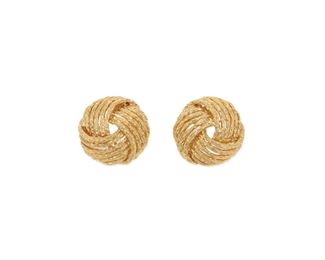 2045
A Pair Of Tiffany & Co. Knot Ear Clips
18k yellow gold, stamped: Tiffany
Designed as round domed knotted earrings, with clip backs
.75" W
18.55 grams
2 pieces
Estimate: $600 - $800