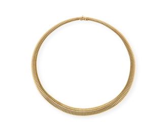 2046
An Italian Gold Tubogas Necklace
14k yellow gold
Slightly graduated with tubogas links
15.25" L x .5" W
44 grams
Estimate: $1,000 - $1,500