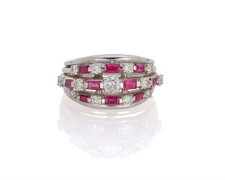 2063
A Ruby And Diamond Ring
Platinum
Designed with thirteen full-cut round diamonds, totaling approximately .2ct, alternating with ten baguette-cut rubies
Ring size: 6.5
11.3 grams
Estimate: $800 - $1,200