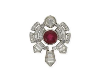 2065
A Glass-Filled Ruby And Diamond Pendant
Platinum
Centering a round glass-filled ruby, weighing 5.04cts, and flanked by a full-cut round diamond, gauged at approximately .9ct and graded H-I color and SI/I clarity, further set with twenty-six single-cut round and twenty-one baguette and three triangular-cut diamonds, totaling approximately 2cts and graded H-J color and VS-SI clarity
1.5" L x 1" W
12.9 grams
Estimate: $1,500 - $2,000