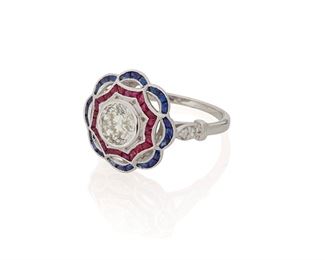 2068
A Diamond And Gem-Set Ring
18k white gold
Centering a full-cut round diamond, weighing 1.07cts and graded H-I color and I1 clarity, surrounded by calibre-cut rubies and sapphires
Ring size: 7
5 grams
Estimate: $2,000 - $3,000