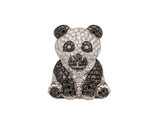 2070
A Black And White Diamond Panda Brooch
Platinum
Entirely pave-set with black and white diamonds, totaling approximately 5cts and graded H-I color and VS clarity and black color and opaque
1" L x .75" W
11.8 grams
Estimate: $1,000 - $1,500