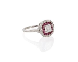 2077
A Diamond And Ruby Ring
Platinum
Centering a rectangular-cut diamond, weighing .5ct and graded E-F color and VS clarity, surrounded by sixteen baguette-cut rubies, totaling .78ct, and fifty-eight full-cut round diamonds, totaling approximately .2ct and graded F-G color and SI clarity
Ring size: 7.25
5.6 grams
Estimate: $2,000 - $3,000