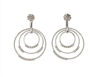 2079
A Pair Of Diamond Circle Drop Earrings
14k white gold
Set with fifty full-cut round diamonds, totaling .87ct and graded G-H color and VS-SI clarity
1.5" L x 1.125" W
11.3 grams
2 pieces
Estimate: $800 - $1,200