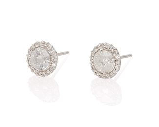 2083
A Pair Of Diamond Halo Stud Earrings
18k white gold
Centering two full-cut round diamonds totaling 1.44cts., and graded J-K color and I-2 clarity surrounded by small round diamond totaling 0.28ct.
2.26 grams
2 pieces
Estimate: $500 - $700