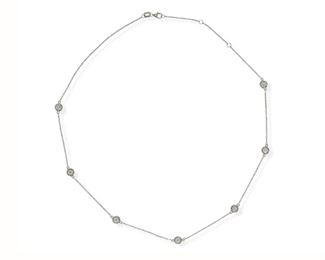 2085
A Diamond Collet Necklace
14k white gold
Set with seven full-cut round diamonds, totaling 1.2cts and graded G-H color and VS-SI clarity
17" L
3.55 grams
Estimate: $1,500 - $2,000
