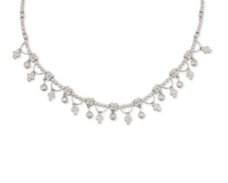 2088
A Diamond Necklace
18k white gold
Set with two hundred eight full-cut round diamonds, totaling 4.54cts and graded F-G color and VS clarity
17" L x .5" H
30 grams
Estimate: $3,000 - $4,000