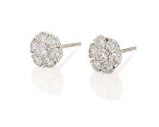 2093
A Pair Of Diamond Flower Earring Studs
14k white gold
Set with fourteen full-cut round diamonds, totaling approximately 1.8cts and graded F-G color and VS clarity
.4" W
2.9 grams
2 pieces
Estimate: $1,000 - $1,500