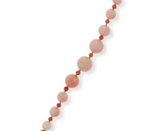 2103
A Coral Bead Bracelet
18k yellow gold
Designed with angel skin coral beads measuring from 11 mm - 18 mm, alternating with deeper orange coral beads measuring 5 mm, with an 18k yellow gold spherical clasp
8" L
36 grams
Estimate: $400 - $600