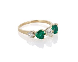 2106
An Emerald And Diamond Ring
14k yellow gold
Set with two heart-shaped emeralds, totaling approximately 1.2cts, and one heart shaped and two full-cut round diamonds, totaling approximately .8ct and graded H-I color and SI clarity
Ring size: 8
2.74 grams
Estimate: $1,500 - $2,000