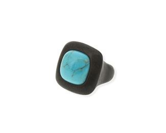 2109
An Italian Sanalitro Turquoise And Wood Ring
Stamped: Sanalitro / Milano / 750
The entire ring of carved wood, topped with a square cabochon turquoise measuring 19 mm x 19 mm
Ring size: 7
15 grams
Estimate: $200 - $300
