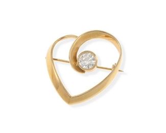 2110
A Diamond And Gold Heart Brooch
14k yellow gold
Centering a full-cut round diamond gauged at approximately .7ct and graded I-J color and VS2 clarity
1" L x 1" W
4.7 grams
Estimate: $1,500 - $2,000