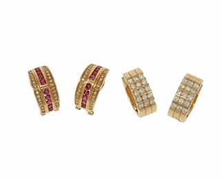 2115
Two Pairs Of Gem-Set Earrings
14k yellow gold
Comprising a pair of diamond post-back hoop earrings set with thirty full-cut diamonds totaling approximately .6ct and graded H-I color and VS clarity (.8" L), and a pair of post and clip-back half hoop earrings set with small rubies and diamonds (.9" L)
23.4 grams
4 pieces
Estimate: $1,000 - $1,500