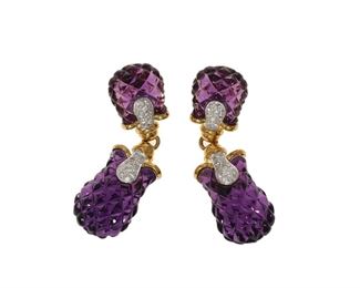 2119
A Pair Of Carved Amethyst And Diamond Earrings
18k yellow gold
Each designed with carved amethyst terminal topped with pave-set diamonds, totaling approximately .9ct and graded G-H color and SI clarity
2" L
29.6 grams
2 pieces
Estimate: $1,200 - $1,800