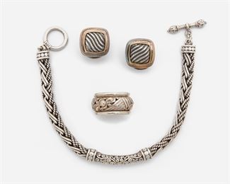 2130
A Group Of Jewelry, Comprising David Yurman
Comprising a pair of 18k yellow gold and sterling silver ear clips, stamped: DY [David Yurman]; an 18k yellow gold and sterling ring; and a sterling silver bracelet
Earrings: .65" H; Ring size: 7.25; Bracelet 7.25"
57.3 grams gross
4 pieces
Estimate: $250 - $350