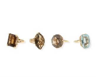 2140
Four Oversized Gemstone Rings
14k yellow gold
Comprising one ring set with an oval blue topaz (ring size: 5.5), a ring set with a round smoky quartz (ring size: 5), a ring set with a rectangular smoky quartz (ring size: 6.5), and a ring set with a marquise smoky quartz (ring size: 8.5)
39 grams gross
4 pieces
Estimate: $800 - $1,200