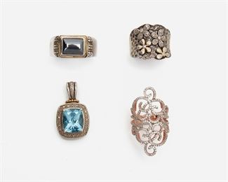 2154
A Group Of Jewelry
Sterling silver and 14k gold
Comprising a topaz and diamond pendant set in sterling silver and 14k yellow gold, stamped: T & C; a hematite ring set with sterling silver and 14k yellow gold; and two sterling rings set with simulated diamonds
Pendant: 1.25" L x .65" W
43.8 grams
4 pieces
Estimate: $250 - $350