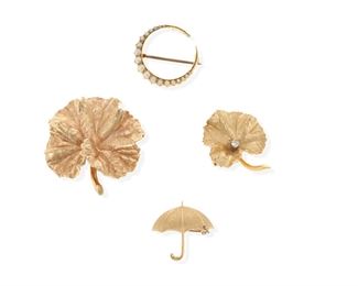 2157
Four Gold Brooches
14k yellow gold
Comprising an umbrella brooch suspending a round diamond (.75" W), a ginkgo leaf set with a round diamond (.85" W), a larger ginkgo leaf brooch (1.35" W), and a crescent moon brooch set with seed pearls (.85" W)
22.8 grams gross
4 pieces
Estimate: $500 - $700