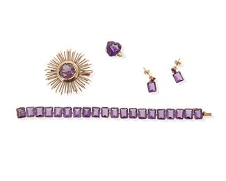 2162
A Group Of Purple Gemstone Jewelry
14k yellow gold
Comprising a pair of post-back amethyst ear pendants (.75" L), a heart-shaped amethyst ring (ring size: 6.25), a bracelet set with twenty rectangular-cut amethysts (6.75" L), and a starburst brooch set with a large round synthetic color-change sapphire (2" W)
42.6 grams
4 pieces
Estimate: $600 - $800