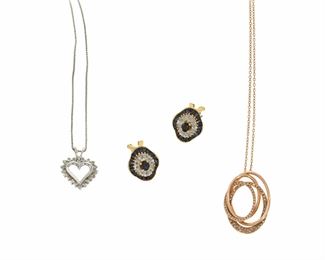 2167
A Group Of Jewelry
Comprising a pair of 18k yellow gold sapphire and diamond ear clips, with posts and retractable posts (.5" L); a 14k rose gold and pave diamond-set circles pendant with neck chain (20" L x 1" H), and a 14k white gold diamond heart pendant with neck chain (20" L x .6" H)
14.5 grams gross
6 pieces
Estimate: $400 - $600