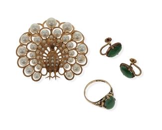 2185
A Group Of Gem-Set Jewelry
14k yellow gold
Comprising a peacock brooch set with cultured pearls, a pair of screw-back earrings set with jadeite, and a matching ring
Brooch: 1.75" H x 2" W; Ring size: 7.75
21.9 grams
4 pieces
Estimate: $500 - $700