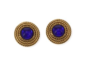 2195
A Pair Of Chanel Blue Gripoix Ear Clips
Gold toned textured metal, stamped: [with double "C"] / Chanel / Made in France / (C)
The round ear clips centering blue glass within a woven rope frame
1.25"
2 pieces
Estimate: $400 - $600