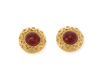 2199
A Pair Of Chanel Red Gripoix Ear Clips
Gold toned textured metal, stamped: [with double "C"] / Chanel / Made in France / (C)
The round ear clips centering red glass within a zigzag patterned frame
1" W
2 pieces
Estimate: $400 - $600