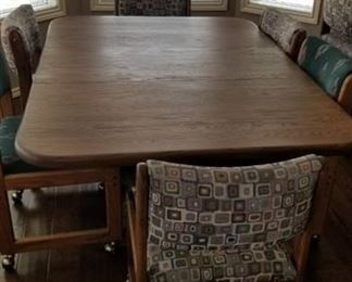 Dining room table 30 x 65 x 46 and 6 chairs (one wheel needs repaired)
