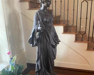 Full-sized cast iron figure.