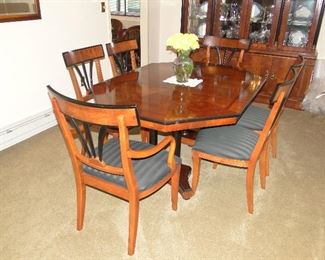 Century Furniture Oriental Style Dining Room Table/Slant Back Chairs with 2 leaves and pads 64x46 and 2 18" leaves. Absolutely beautiful. $850. Table is Hexagon shaped.