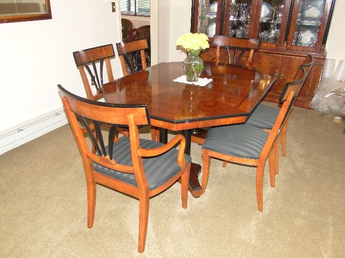 Century Furniture Oriental Style Dining Room Table/Slant Back Chairs with 2 leaves and pads 64x46 and 2 18" leaves. Absolutely beautiful. $850. Table is Hexagon shaped.