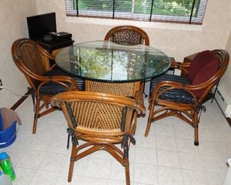 Wicker Kitchen Table with 4 chairs $300  44x30. Very clean!