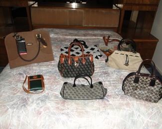 Dooney and Bourke and Coach Handbags prices vary, new wallets