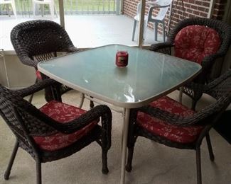 Glass Patio Table and Wicker Chairs