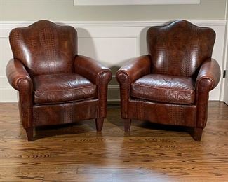 PAIR LEATHERCRAFT CLUB CHAIRS | In overall brown alligator-print leather upholstery on wood feet, both appearing in excellent condition; h. 37 x w. 36 x d. 37 in., great size and wonderful vibe! 