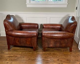 PAIR LEATHERCRAFT CLUB CHAIRS | In overall brown alligator-print leather upholstery on wood feet, both appearing in excellent condition; h. 37 x w. 36 x d. 37 in., great size and wonderful vibe! 