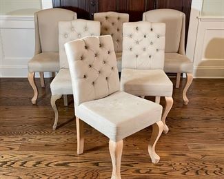(6pc) UPHOLSTERED DINING CHAIRS | An assembled set, four with tufted backs [one with different legs] and two with smooth backs [some with stains and other markings to upholstery]; h. 41 x w. 23 x d. 25 in. 